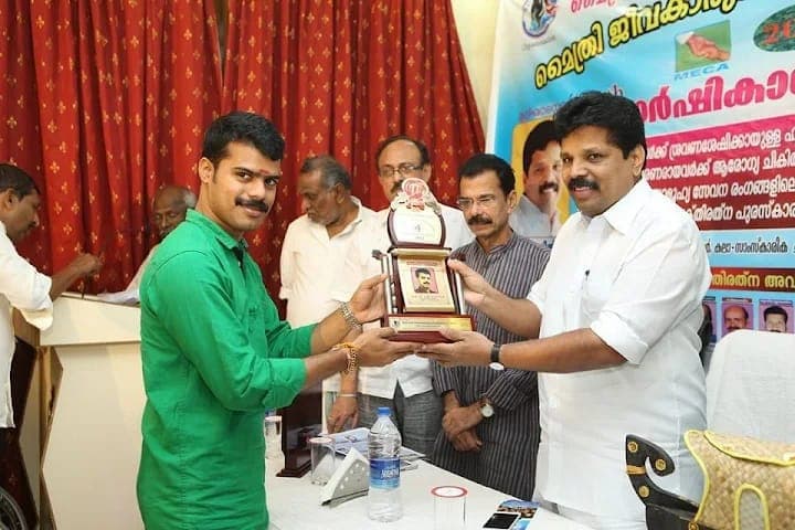 Kerala Astrologer award and recognition photo